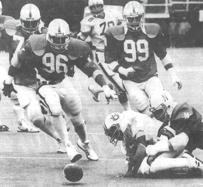 Jimmy Williams (96) gets ready to pounce on the Auburn fumble that set up Nebraska’s first touchdown.